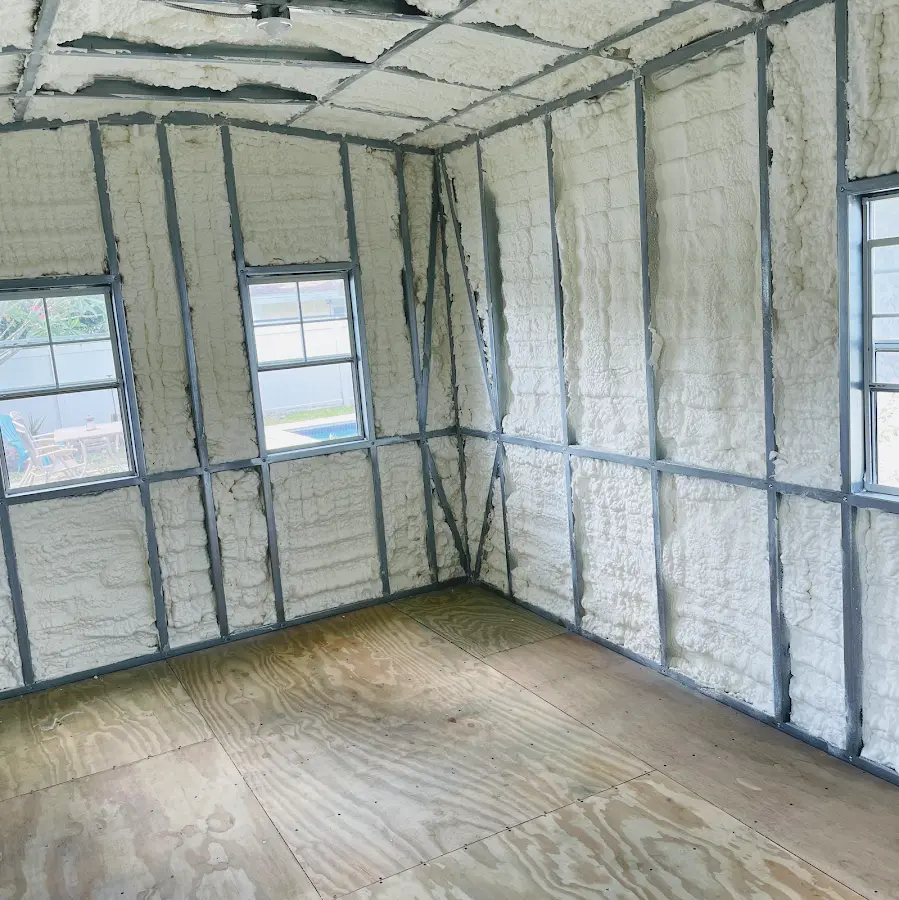 Closed-cell spray foam insulation applied to wall cavities in a residential project in Pikeville
